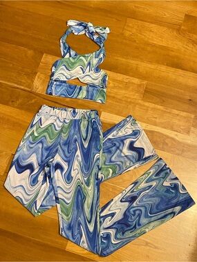 The Kript Liquid Mesh Wrap Top & Flare Pants